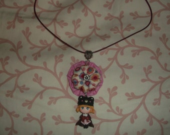 Yoyo Flower necklace and her doll polymer clay