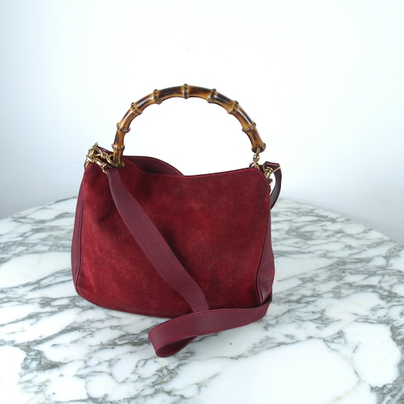 red suede gucci bag