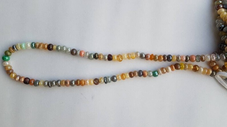 AAA+++1 Strand silverite opal multi plain smooth rondelle beadsmulti opal plane rondelle beadsnatural disco opal beadsopal Silverite13