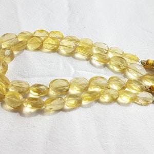 AAA++1 Strand yellow fluorite oval shape faceted beads/Natural yellow fluorite oval faceted Beads/8.00x10.00mm to 8.50x11.00mm/8&#39;&#39; length
