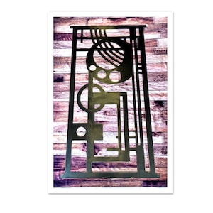 May include: A black metal wall art piece with geometric shapes and circles, mounted on a wood panel background.