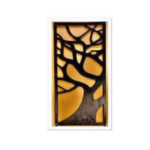 May include: A black metal wall decor with a tree branch design. The background is a light brown color.