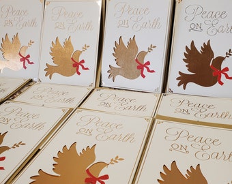 Cartoline di Natale con colomba dorata pesante