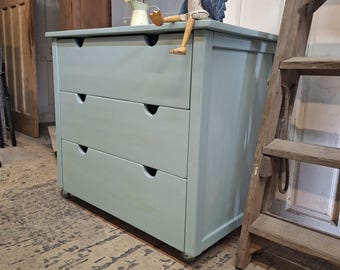 Chest of drawers, solid pine with castors.