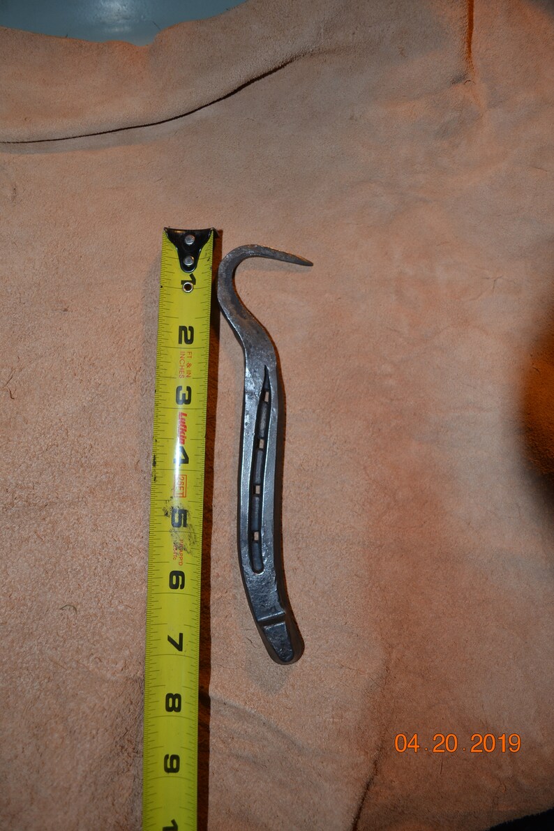 Horseshoe hoof pick