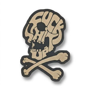 May include: A black skull and crossbones design with the words "FUCK SHIT UP" in a tan, stylized font. The skull has a distressed look, and the bones are crossed below. The design is on a white background.