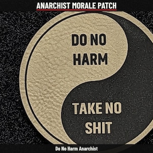 May include: A circular morale patch featuring a yin-yang design in tan and black. The tan section contains the black text DO NO HARM, while the black section contains the tan text TAKE NO SHIT. The patch has a textured surface finish.