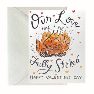 May include: A Valentine's Day card with a watercolor illustration of a campfire with the text "Our Love Has Me Fully Stoked" and "Happy Valentines Day".