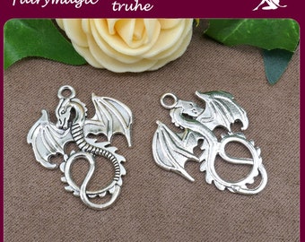 10 or 20 dragon pendants in old silver color