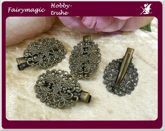 0.80 EUR / piece 4 small floral hair clips old bronze coloured 35 x 24 mm