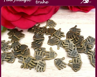 0.05 EUR / piece. 50 pendants hand made handmade hands labeled on both sides in old bronze color