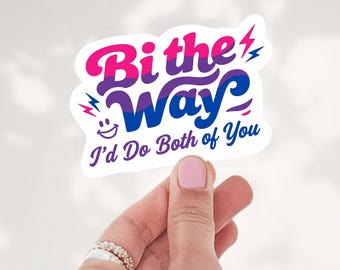 May include: A die-cut sticker featuring the text Bi the Way in a pink, purple, and blue gradient font. Below, the text I'd Do Both of You appears in purple. The design includes small lightning bolt icons and a smiling face graphic.