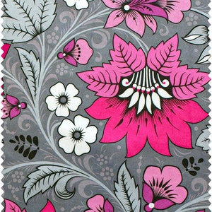 May include: A grey fabric with a pink and white floral pattern. The flowers are stylised and have a traditional look. The fabric is perfect for crafting projects, quilting, or making clothing.