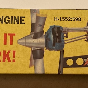May include: A vintage Revell model kit box for an Allison Prop-Jet Engine. The box is yellow with the text "ALLISON PROP-JET ENGINE", "SEE IT WORK!", and "MOTORIZED!". The box features an illustration of the engine and propeller.