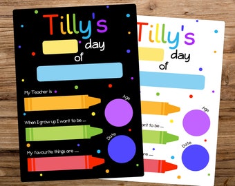 May include: Two rectangular school milestone signs, one black and one white, featuring colorful confetti dots. Each sign displays the text Tilly's day of, with blank fields for teacher, age, date, and future career goals, accented by crayon graphics.