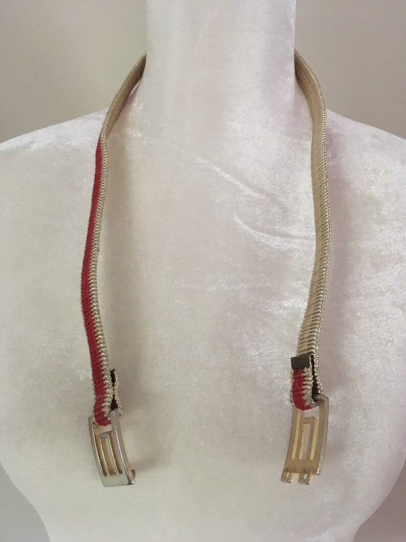 Vintage gold metallic and red stretch belt with geometric clasp