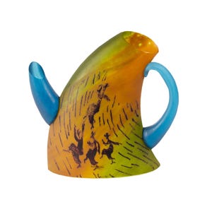 May include: A colorful teapot with a blue handle and spout. The body of the teapot is painted with a gradient of yellow, orange, and green, featuring black silhouette figures. The teapot has a unique, artistic design.