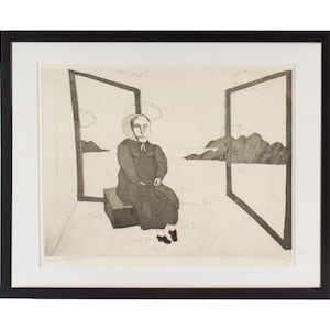 May include: A framed black and white etching print featuring a figure wearing a bonnet and long dress, seated on a rectangular box. The scene includes two large rectangular frames showing landscape views with hills and clouds in the background.