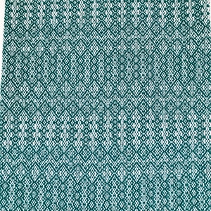 May include: A close-up of a teal and white woven fabric with a repeating diamond pattern. The fabric has a textured appearance, with the white threads creating a contrasting design against the teal background. The pattern is consistent across the entire surface.