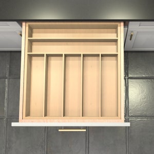 May include: A wooden drawer with six compartments for organizing utensils. The drawer is open and the compartments are empty.