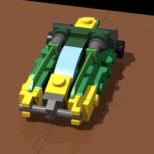 Könnte beinhalten: Ein grünes und gelbes Lego-Spielzeugauto mit einem blauen und weißen Streifen an der Seite. Das Auto hat ein schwarzes Rad auf der rechten Seite.