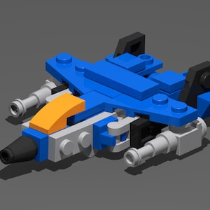 May include: A blue and grey Lego spaceship with orange accents and two silver cannons. The spaceship has a pointed nose and a flat bottom.
