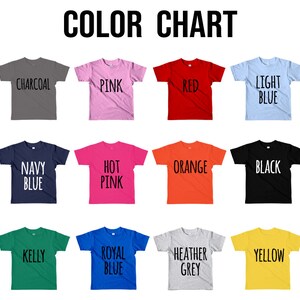 May include: Color chart showing 12 different t-shirt colors: Charcoal, Pink, Red, Light Blue, Navy Blue, Hot Pink, Orange, Black, Kelly, Royal Blue, Heather Grey, and Yellow.