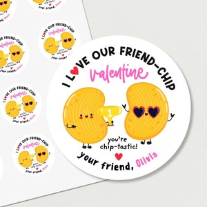 May include: A set of 10 round Valentine's Day stickers featuring a cartoon chip with sunglasses and a heart. The text on the sticker reads "I love our friend-chip Valentine you're chip-tastic! your friend, Olivia".