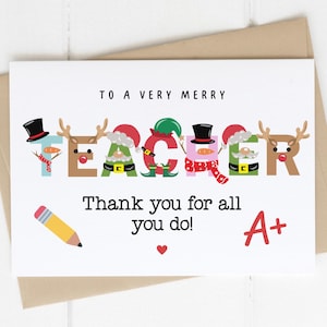 May include: A white greeting card with the word "TEACHER" decorated with festive characters. The card reads "To a very merry" and "Thank you for all you do!" with a pencil and A+ grade symbol.
