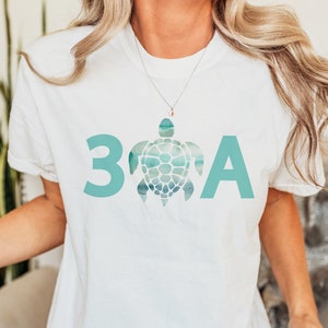 Skip A Straw Save A Turtle Graphic Turquoise T-Shirt Skip A Straw Save A Turtle Graphic Turquoise T-Shirt