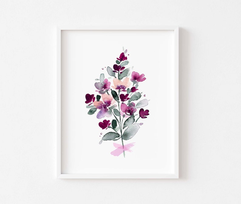 May include: A watercolour painting of a bouquet of pink and purple flowers with green leaves. The flowers are arranged in a loose, organic style, and the painting has a soft, romantic feel.