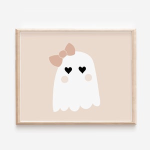 May include: A white ghost with a pink bow and black heart eyes on a light pink background.