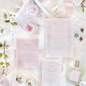 May include: Wedding invitation suite with a pink and white floral design. The invitation features a delicate floral border and the text "And so the wedding begins..." followed by the couple's names, "Harley Myers and Noah James Guthrie", the date, "Saturday, the 22nd of July", the time, "at four in the afternoon", the location, "White Pine Manor", and the city, "Bridgeville, Delaware". The RSVP card features the text "You are cordially invited to July 22nd" and the couple's names.