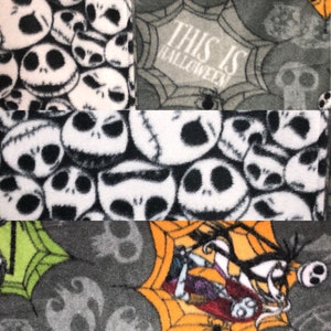 May include: A patchwork fabric featuring various Halloween-themed designs. The top left and center panels display Jack Skellington faces in black and white. The top right panel has the text "THIS IS HALLOWEEN". The bottom panels feature spiderwebs and characters.
