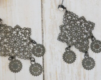 Beautiful thin intricate metal work designed earrings