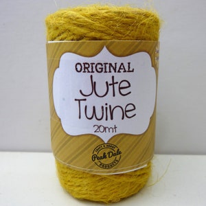 May include: A roll of yellow jute twine labeled "ORIGINAL Jute Twine 20mt" with a Peak Dale Products logo.