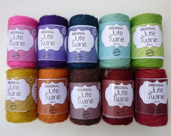 May include: Ten spools of natural jute twine, each 20 meters long, in a variety of colors including pink, purple, teal, green, yellow, orange, brown, red, and burgundy. The spools are labeled "Original Jute Twine 20mt".