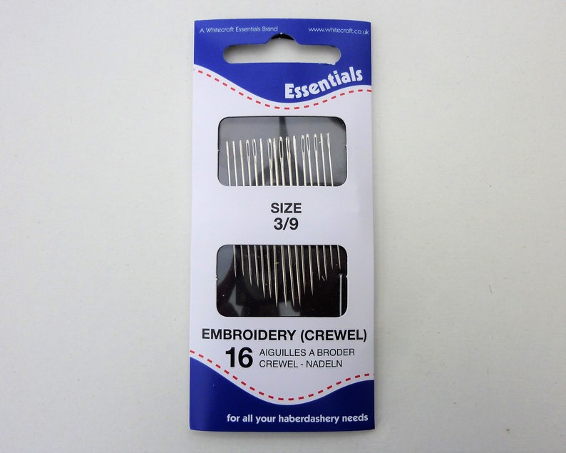 May include: A package of 16 size 3/9 embroidery needles. The package is blue and white with the text "Essentials" and "Embroidery (Crewels)".