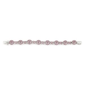 May include: A silver bracelet with a chain link design. Each link is set with small pink gemstones.