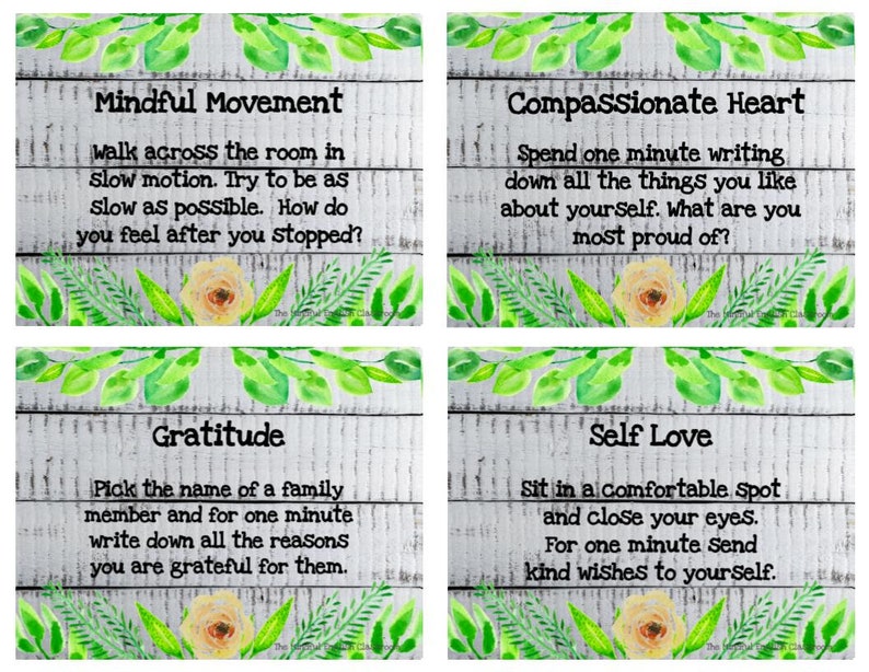May include: Four white wooden cards with green leaves and yellow flowers. Each card has a different self-care activity: Mindful Movement, Compassionate Heart, Gratitude, and Self Love. The text on each card describes the activity.