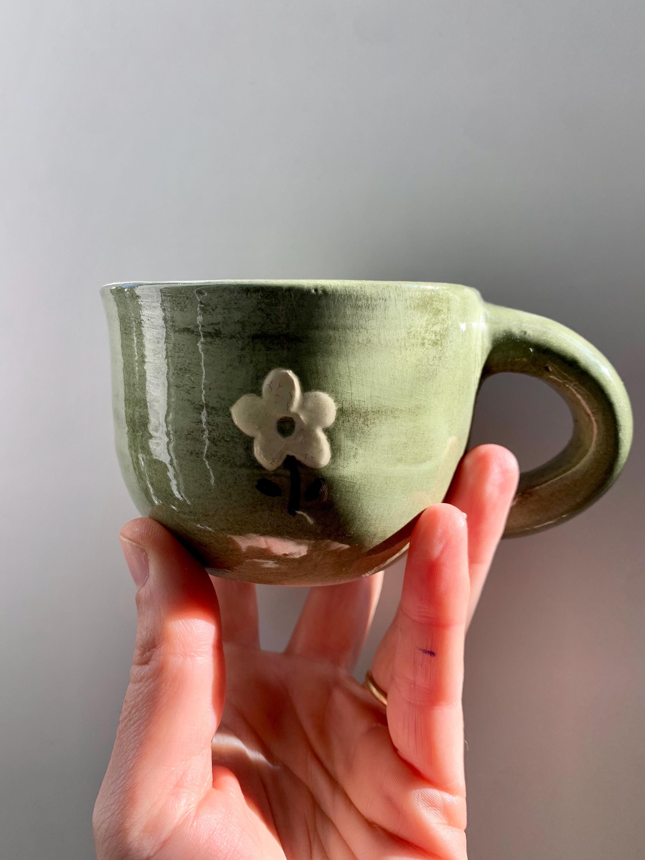 green daisy mug