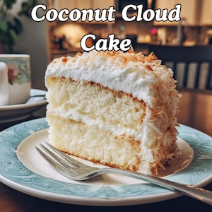May include: A slice of Coconut Cloud Cake on a blue and white patterned plate with a silver fork. The cake has layers of white cake, white frosting, and is topped with toasted coconut. The words "Coconut Cloud Cake" are in the image.