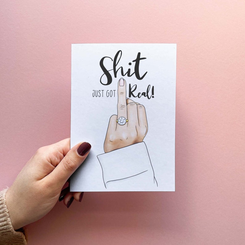 Funny Engagement Card For Best Friend. Celebrate the Engagement Announcement with this funny card reading Sh*t just got real! This engagement greetings card is the perfect way to wish happy wedding day to a son or daughter, wedding greetings to a friend, or engagement shower invitations.