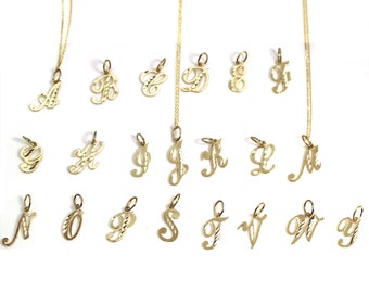 May include: A set of 26 gold-plated alphabet letter charms. Each charm is a cursive letter with a diamond-cut design. The charms are displayed on a white background.