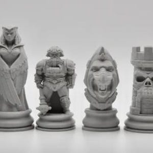May include: A set of gray chess pieces featuring characters from a fantasy theme. The pieces include a muscular figure with a sword, a robed queen, a warrior, a monster head, a skull tower, and a hooded figure.