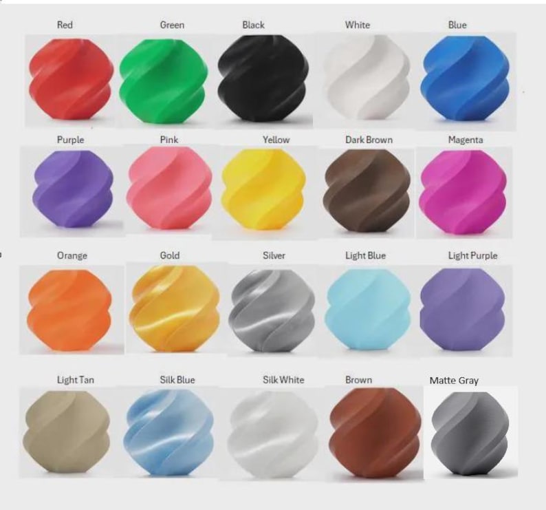 May include: A display of spiral-shaped objects in a range of colours. The colours include red, green, black, white, and blue. Other colours are purple, pink, yellow, dark brown, magenta, orange, gold, silver, light blue, light purple, light tan, silk blue, silk white, brown, and matte grey.
