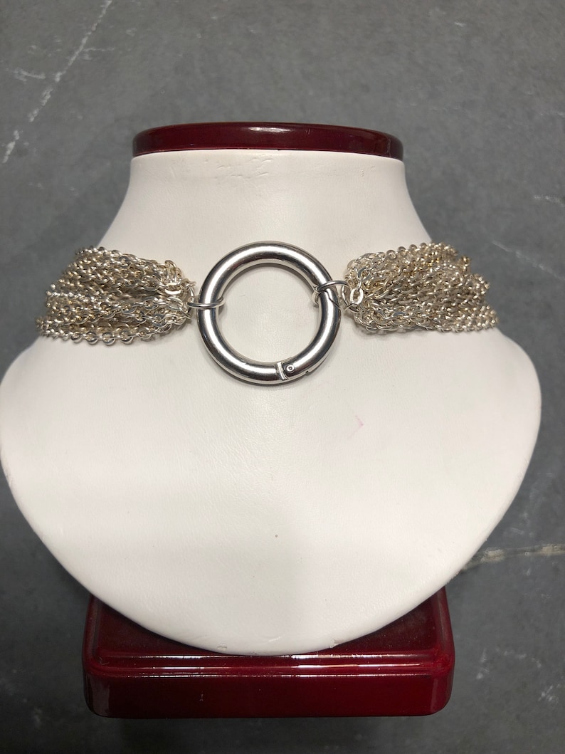Elegant multi strand day collar with steel ring clasp.