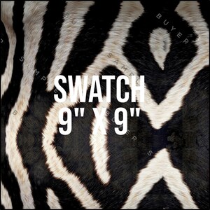 May include: A square swatch with a zebra print pattern. The black and white design features bold stripes. The text "SWATCH 9" X 9"" is overlaid on the image. The swatch measures 9 inches by 9 inches.