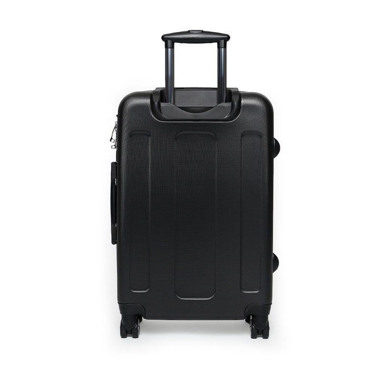 May include: Black hard-sided suitcase with a retractable handle and four wheels.