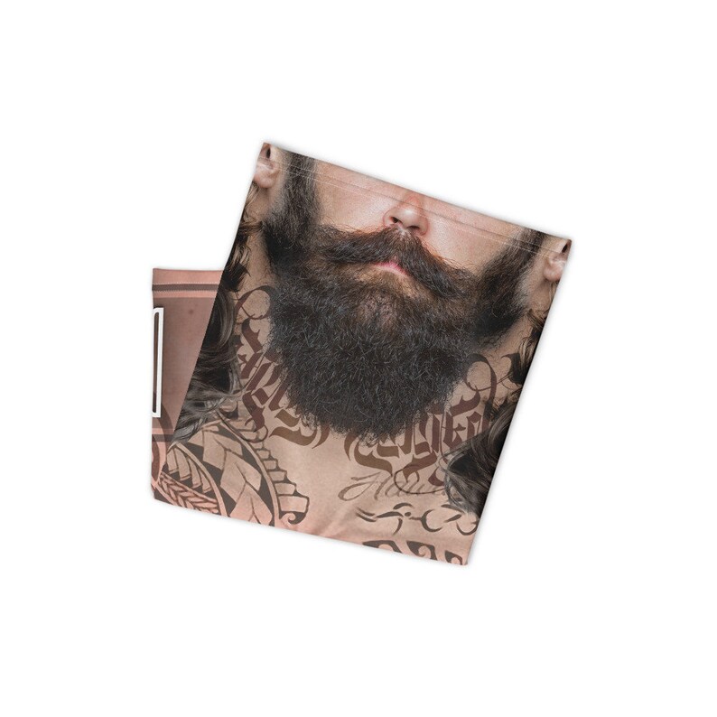 May include: A face mask with a printed image of a man with a long beard and tattoos on his neck and chest.